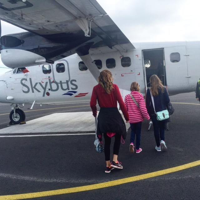 Boarding the Skybus Twin Otter, which seats 16 people! 