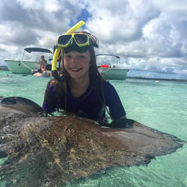 Stingray City in Antigua is the most amazing experience. Take the speed boat out to a shallow open area in the Atlantic and swim with the friendly stingrays. 