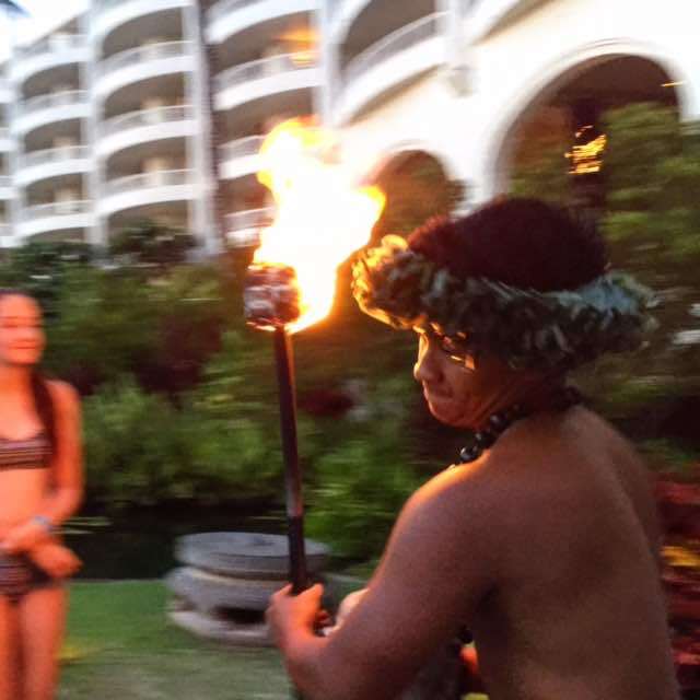 Ever wonder how all the tiki torches are lit each evening at the Fairmont Kea Lani? It's the torch lighting ceremony, every night at sunset in the summer. Just look for all the kids following him around! 