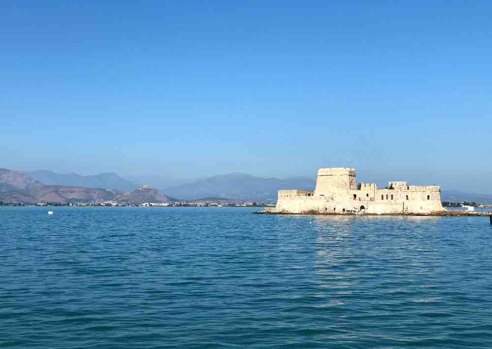 Make your way over to the port (in the old town) and you’ll be treated to a view of Bourtzi, a Venetian fortress that is set in the harbour on the tiny island of Agioi Theodoroi. Bourtzi is one of the most photographed sites in Nafplio. In the 1860s the town’s executioners of Palamidi prisoners used to live here. Before that it was connected to Akronafplia with a long metal chain to protect the port against invading ships. In high season you can visit via boat trip. We weren’t able to do this but we just loved admiring it!