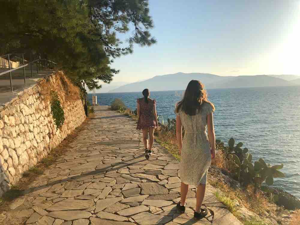 When the sun is about to set, take the Arvanitia Promenade – one of the most popular walks in town.